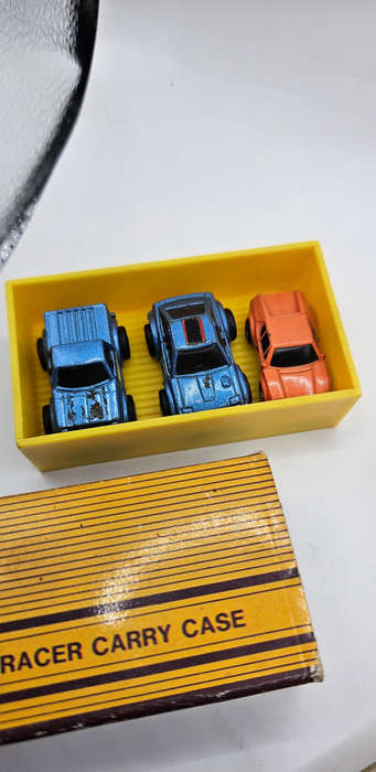 Micro Racer Carry Case sets, from 1988, containing small die-cast cars.