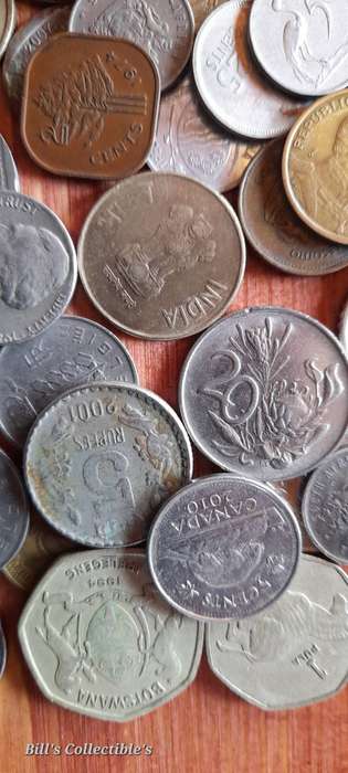 60 Coins From Around The World . 1 bid Takes All
