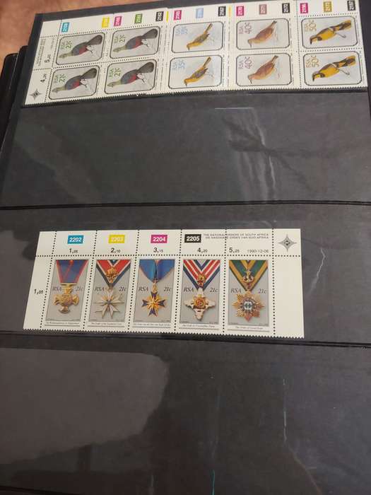 STAMP ALBUM WITH RSA STAMPS DATES FROM 1983 TO 1993
