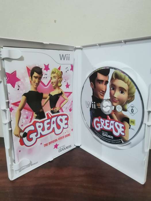Grease on Nintendo Wii with booklet