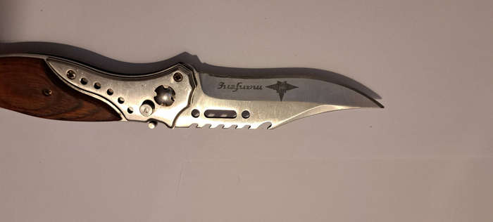 Metal and Wood Springloaded Knife