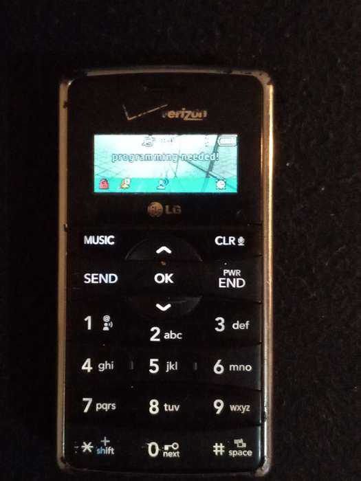 LGENV2X9100 flip open cell phone