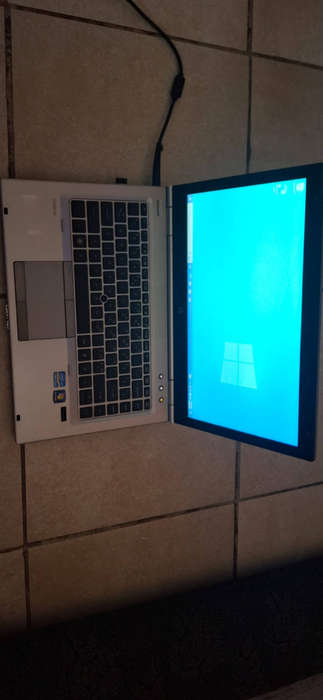 A Box of 5 Laptops