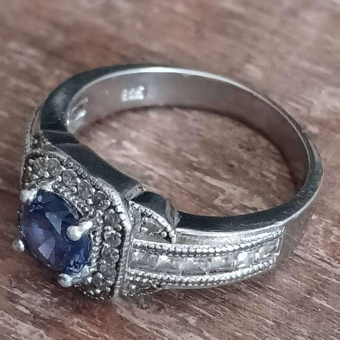 Sterling Silver Ladies Ring with Blue Stone  Marked 925