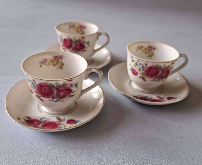 Three Japanese Rose-patterned Coffee Cups and Saucers