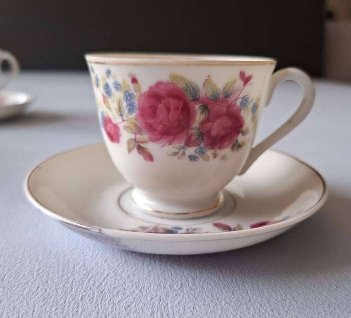Three Japanese Rose-patterned Coffee Cups and Saucers