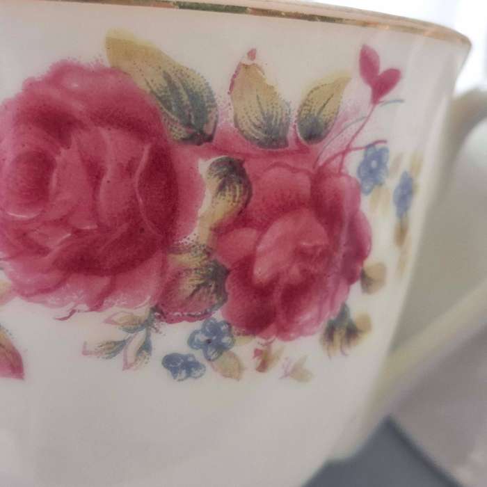 Three Japanese Rose-patterned Coffee Cups and Saucers