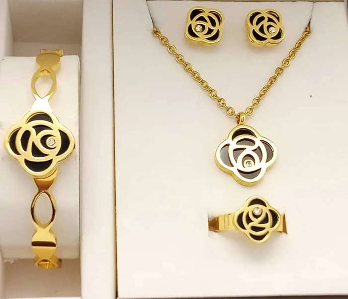 Combo of Gold Plated Chain Pendant Earrings Bracelet and Ring Jewellery Set for Women