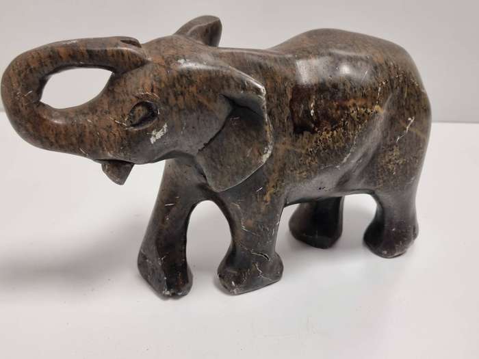 Collection of Elephant Carvings and Other
