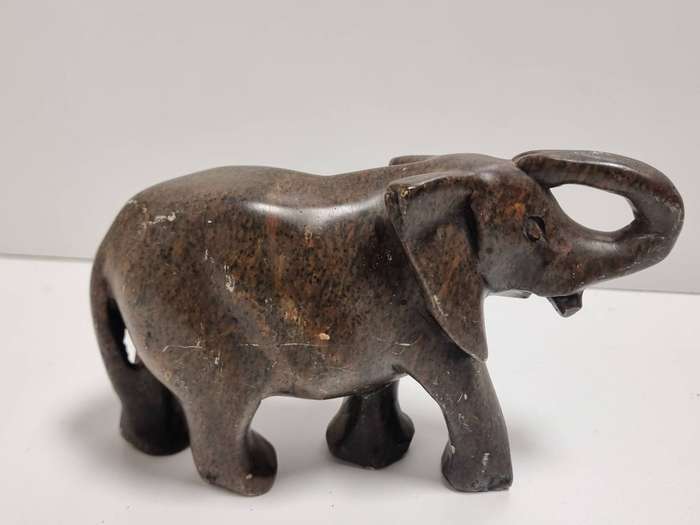 Collection of Elephant Carvings and Other