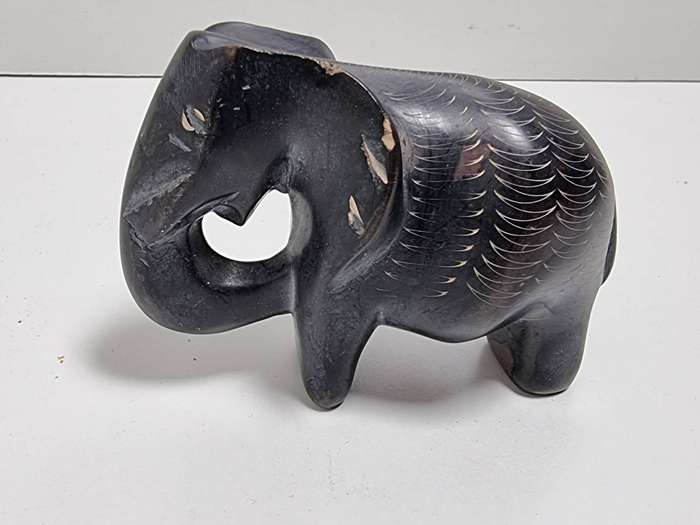 Collection of Elephant Carvings and Other