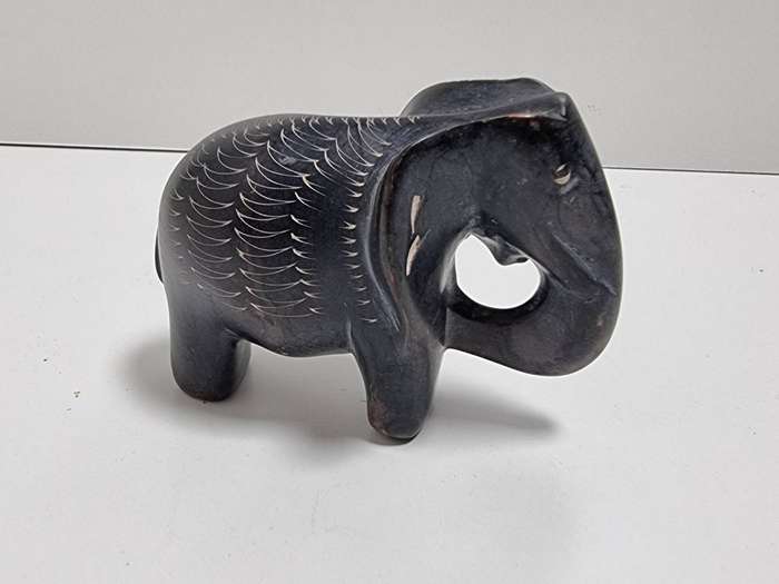 Collection of Elephant Carvings and Other