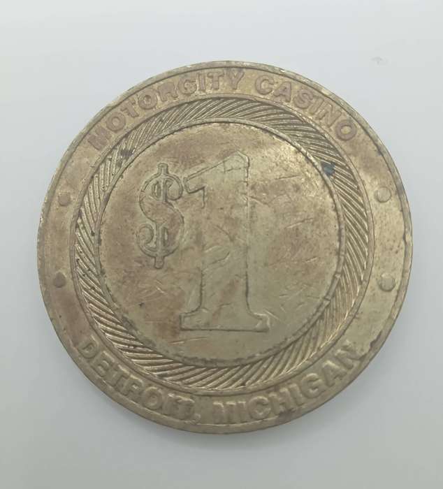 ONE DOLLAR GAMING TOKEN - MOTOR CITY- DETROIT MICHIGAN- NOT LEGAL TENDER
