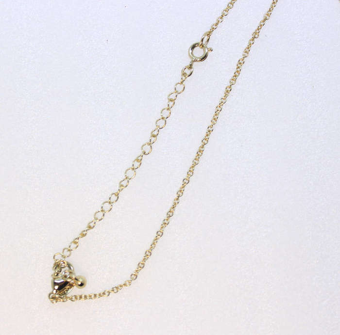 Black and Gold Pendant Necklace with Heart Shaped Pendant by Avon