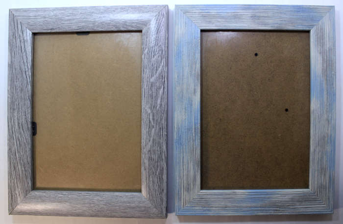 Two Pale Pastel Coloured Photo Frames With Stands