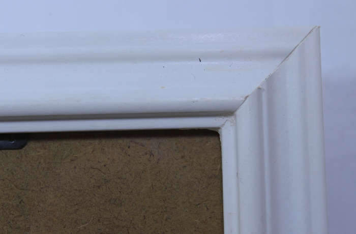 Three Various Sized White Photo Frames With Stands