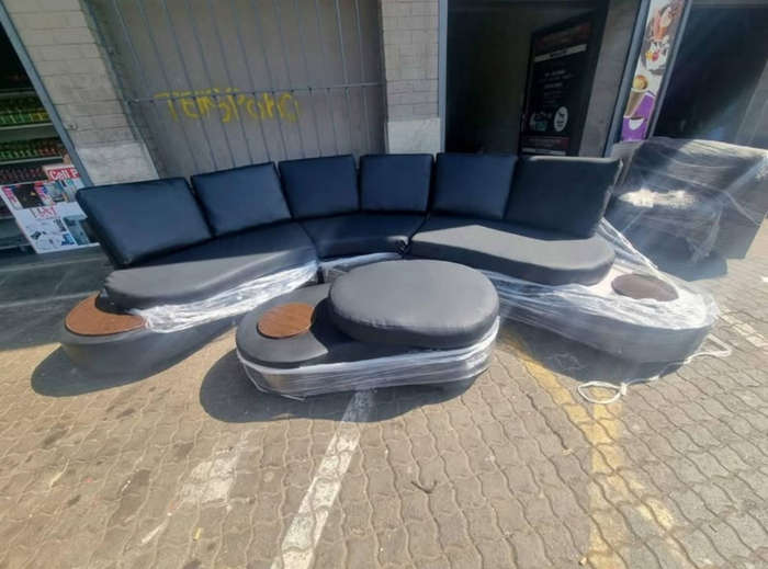 6 seaters leather and velvet couch with a matching coffee table