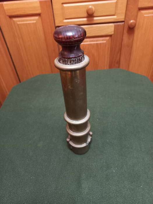 Antique brass and wood cake decorator
