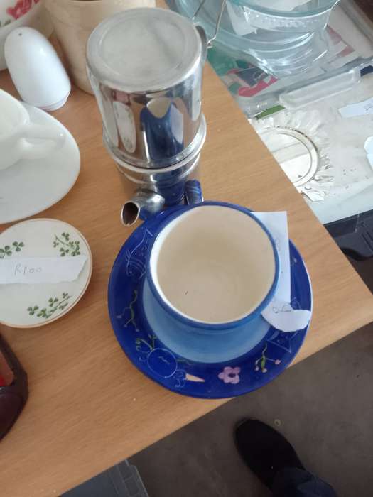 Antique cup and  saucer with tea pot