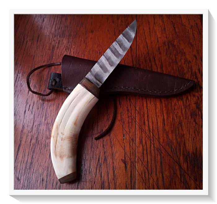 A Fine Hand-Forged Tiger Steel Hunting Knife crafted from a Warthog Tusk - 240mm in Length
