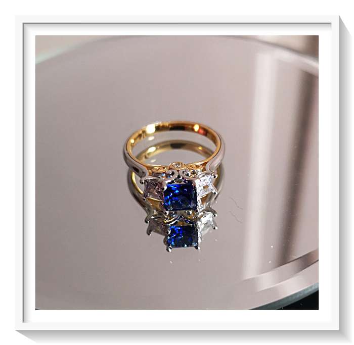 A Spectacular Sterling Silver Ring with Zircons and Vivid Blue Simulated Stone - Size 7 For Her