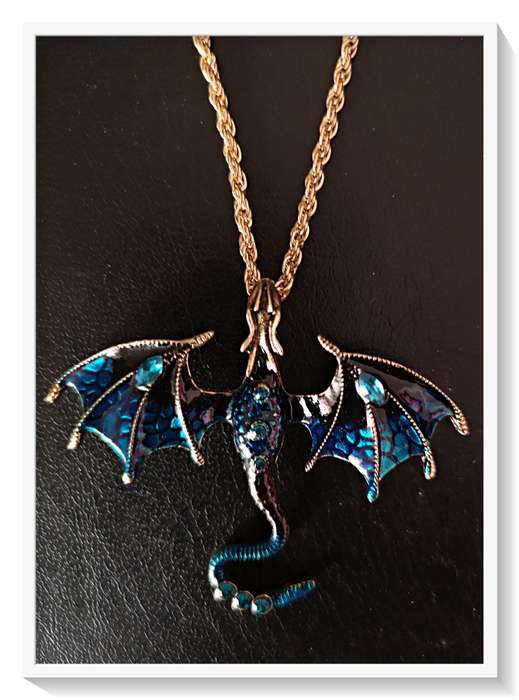A Whimsical Deep Blue Dragon Necklace Metal Pendant with Simulated Blue Diamante and Enamel Coating