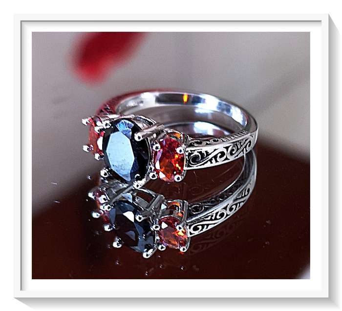 Genuine 925 Sterling ring with Dark Blue Zircon as the Primary Stone - Size 8 - Makes a Lovely Gift