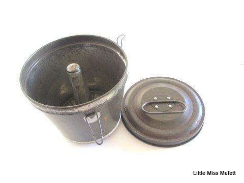 A VINTAGE ALIUMINIUM PUDDING STEAMER