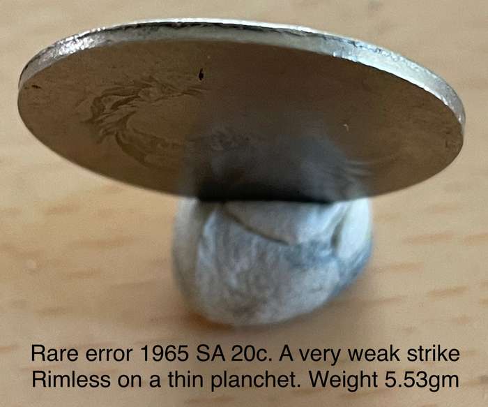 Rare error 1965 SA 20 cents. A very weak strike on a rimless thin planchet. See with photos