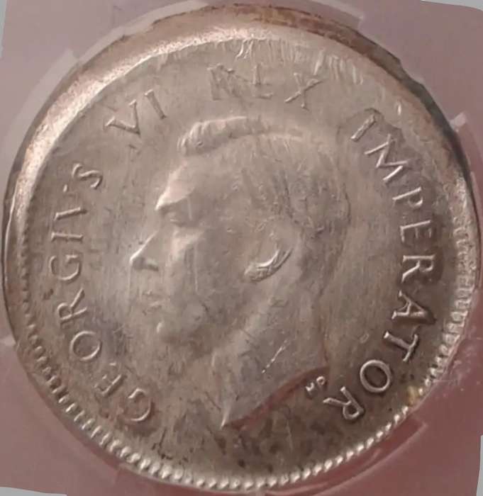 Rare misstruck graded 1942 SA tickey 3d.