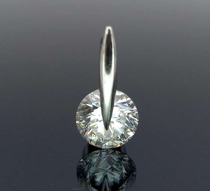 Modernist white gold and sparkly CZ pendant