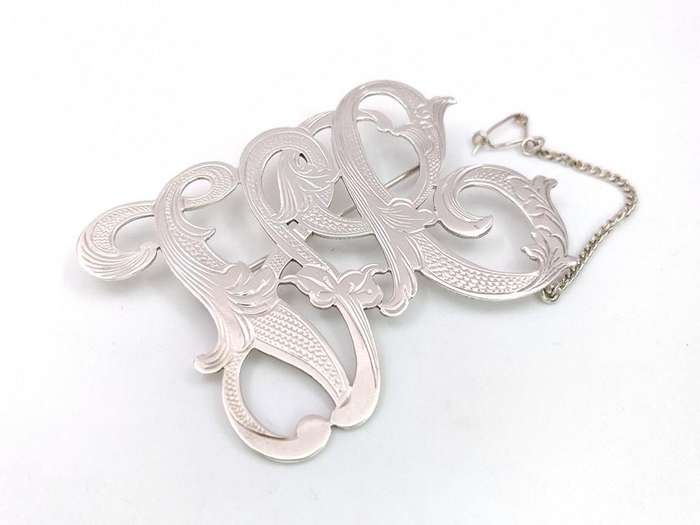 Gorgeous sterling silver scrolled initials brooch