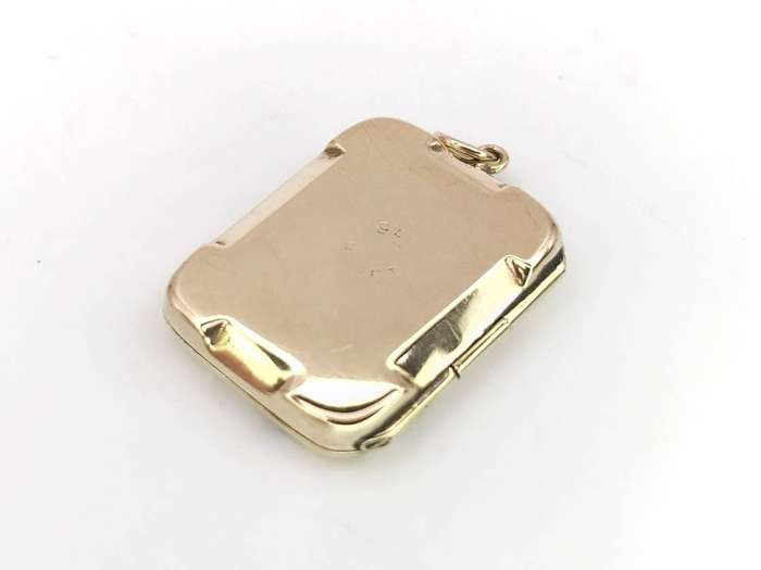 Vintage 9ct gold sun ray locket