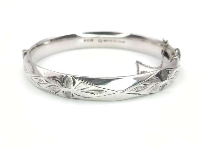 Vintage sterling silver faceted engraved bangle