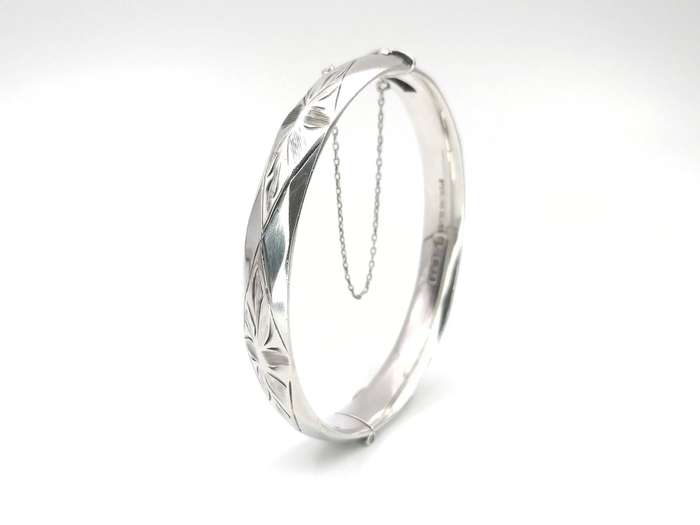 Vintage sterling silver faceted engraved bangle