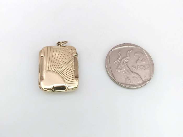 Vintage 9ct gold sun ray locket