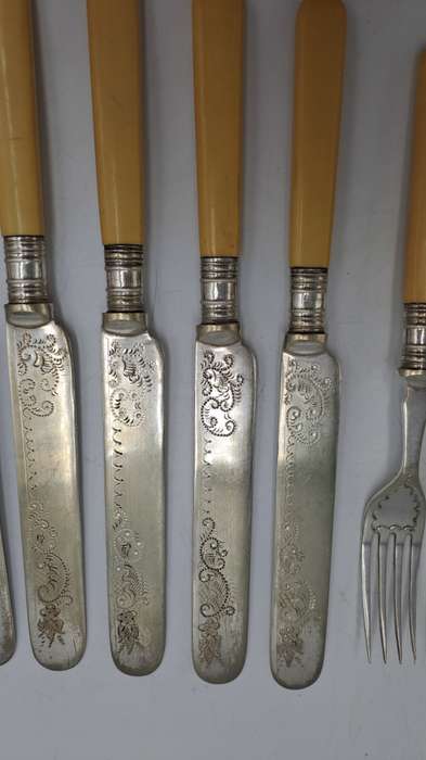 12 Antique Sheffield knifes and forks -The large Knife has hallmark sterling silver Collar