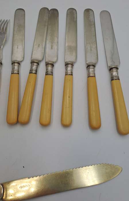 12 Antique Sheffield knifes and forks -The large Knife has hallmark sterling silver Collar