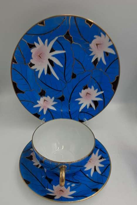 24pc Blue,White and Gold Bone China teaset one cup Missing -5 full trios