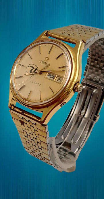 Vintage 1980's Omega quartz 1384 watch with United Logo -engraved -running but need repairs