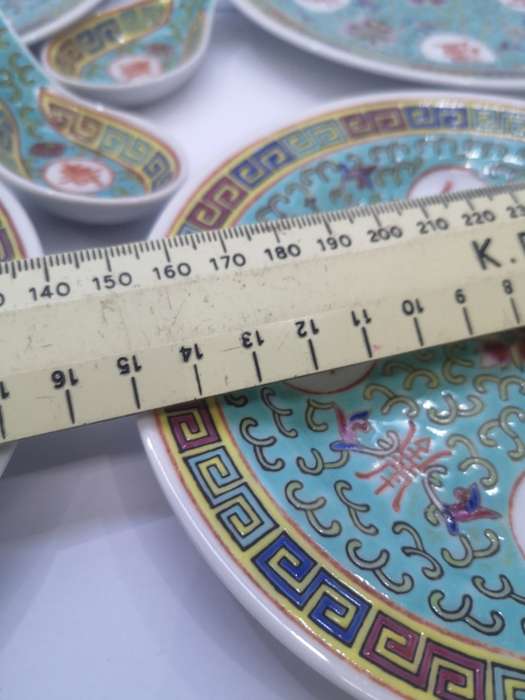 Collection of oriental plates and spoons