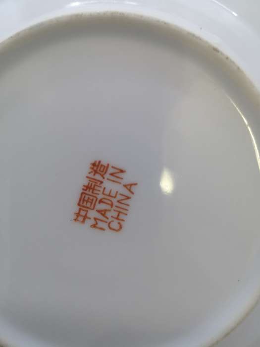 Collection of oriental plates and spoons
