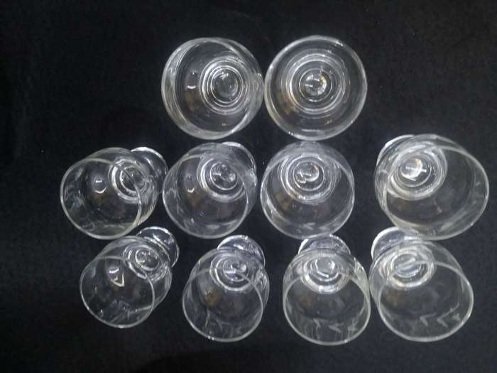 Set of ten cut glass sherry glasses