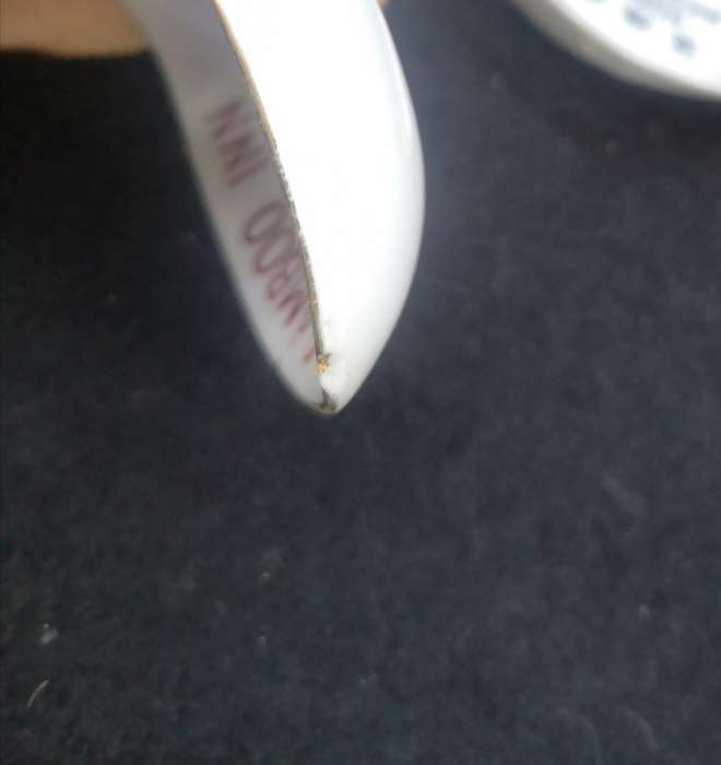 Chinese soup spoons - note small chip