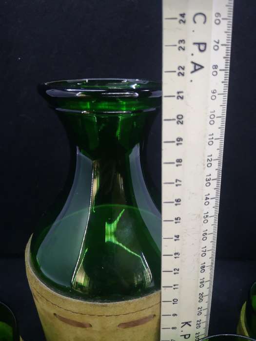 Green glass bottle decanter and set of 6 glasses encased in leather