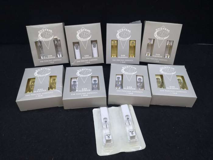 9 sets of Studex earrings