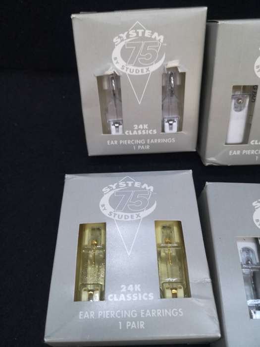 9 sets of Studex earrings