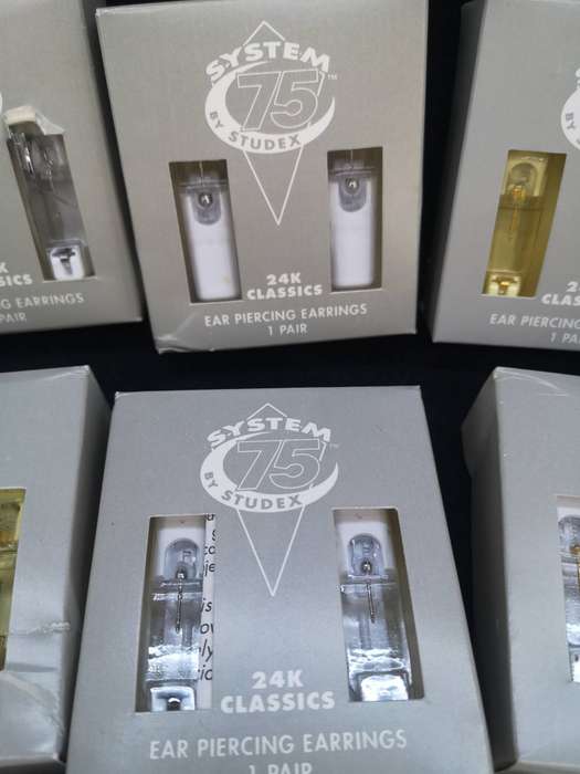9 sets of Studex earrings