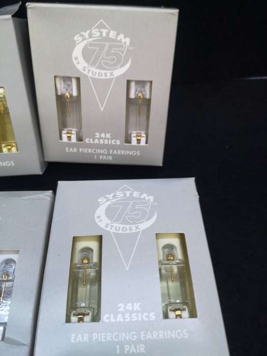 9 sets of Studex earrings