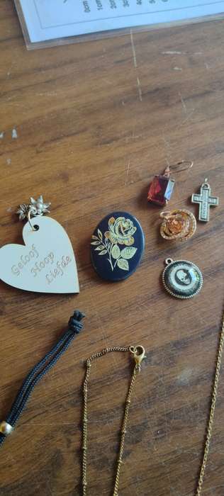 Lot of costume jewelry in octagonal jewelry box